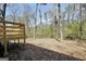 View from the back deck shows a spacious backyard with natural surroundings at 40 Derby Country Dr, Ellenwood, GA 30294
