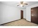 Bedroom boasts wall-to-wall carpeting, white walls, ceiling fan and two windows at 40 Derby Country Dr, Ellenwood, GA 30294