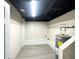 Unfinished basement with water heater and neutral walls. Ready for customization at 25 Stoneway Dr, Villa Rica, GA 30180