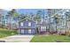 Charming two-story home with a covered carport and well-maintained lawn at 25 Stoneway Dr, Villa Rica, GA 30180