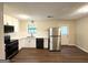 Updated kitchen with stainless steel appliances, white cabinets, and subway tile backsplash at 25 Stoneway Dr, Villa Rica, GA 30180