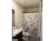 Bathroom with a shower, vanity, toilet, and tile flooring at 11909 Lovejoy Crossing Blvd, Hampton, GA 30228