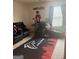 Atlanta Falcons themed bedroom with black leather gaming chairs and decorative accents at 11909 Lovejoy Crossing Blvd, Hampton, GA 30228