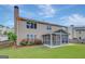 Spacious backyard features a screened porch and well-maintained landscaping at 340 Aster Ridge Trl, Peachtree City, GA 30269
