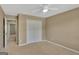 Neutral bedroom features a ceiling fan, carpet, and closet at 340 Aster Ridge Trl, Peachtree City, GA 30269