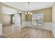 Inviting dining room featuring wainscoting and a bright window at 340 Aster Ridge Trl, Peachtree City, GA 30269