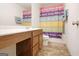 Bathroom with a colorful shower curtain, vanity, and tile flooring at 1560 Avalon Creek Rd, Sugar Hill, GA 30518
