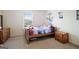 Bright bedroom with a unicorn theme and natural light from the window at 1560 Avalon Creek Rd, Sugar Hill, GA 30518