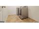 Laundry room with tile floor and washer and dryer appliance hookups at 1560 Avalon Creek Rd, Sugar Hill, GA 30518