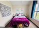 Inviting bedroom featuring neutral walls, carpet and lots of natural light at 1741 Portwest Way, Hampton, GA 30228