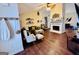 Inviting living room with a fireplace, hardwood floors, and tasteful decorations at 1741 Portwest Way, Hampton, GA 30228