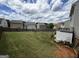 Wide shot of a backyard enclosed by a wooden fence, providing privacy and space at 1369 Star Water Dr, Lawrenceville, GA 30045