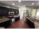 Well-equipped kitchen featuring granite countertops, stainless steel appliances, and ample cabinet space at 1369 Star Water Dr, Lawrenceville, GA 30045