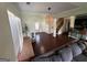 Cozy living room features hardwood floors, neutral paint, and a staircase leading to the upper level at 1369 Star Water Dr, Lawrenceville, GA 30045