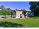This home has a spacious backyard, a carport, and a small, covered back porch at 50 Caroline Ave, Stockbridge, GA 30281