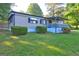 Charming home with a covered porch and well-maintained lawn at 50 Caroline Ave, Stockbridge, GA 30281