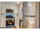 Modern kitchen featuring stainless steel appliances and stylish white cabinets at 50 Caroline Ave, Stockbridge, GA 30281