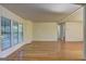 Generous living room space with hardwood floors and neutral walls at 50 Caroline Ave, Stockbridge, GA 30281
