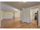 Spacious living room with hardwood floors, ample natural light, and an open layout at 50 Caroline Ave, Stockbridge, GA 30281