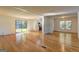 Spacious living room featuring gleaming hardwood floors and ample natural light at 50 Caroline Ave, Stockbridge, GA 30281