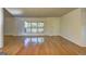 Bright living room with hardwood floors and ample space at 50 Caroline Ave, Stockbridge, GA 30281