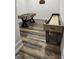 Game room featuring foosball and shuffleboard tables on beautiful wood laminate flooring at 155 Green Meadow Ln, Fayetteville, GA 30215