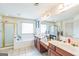 Spacious primary bathroom with soaking tub, dual vanities, and shower at 3006 Gold Creek Dr, Villa Rica, GA 30180