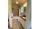 Bathroom featuring a shower/tub combo, neutral color palette, and granite countertops at 1345 Cashiers Way, Roswell, GA 30075