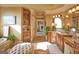 Well-lit bathroom offers a double vanity, granite countertops, and a garden tub at 1345 Cashiers Way, Roswell, GA 30075
