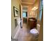 Charming bathroom featuring tile flooring, a wooden vanity, and neutral paint tones at 1345 Cashiers Way, Roswell, GA 30075