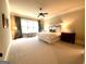 Spacious bedroom with a large window and hardwood floors at 1345 Cashiers Way, Roswell, GA 30075