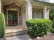 Charming front entrance with stone accents and manicured garden at 1345 Cashiers Way, Roswell, GA 30075