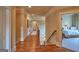 Hallway with wood floors leads to bedroom at 1345 Cashiers Way, Roswell, GA 30075