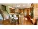 Spacious kitchen with wood cabinets, granite countertops, and stainless steel appliances at 1345 Cashiers Way, Roswell, GA 30075