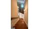 Staircase with wood treads, white risers and handrail leading upstairs at 1345 Cashiers Way, Roswell, GA 30075
