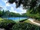 Well-maintained community tennis courts surrounded by lush landscaping and greenery at 1345 Cashiers Way, Roswell, GA 30075