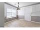 Cozy dining room featuring tile flooring and a view to the outside at 135 Gingercake Ct, Fayetteville, GA 30214