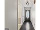 Inviting entryway showcasing hardwood floors and views of the kitchen at 135 Gingercake Ct, Fayetteville, GA 30214