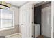 Bright laundry area with window, machines and easy access, adding convenience to household chores at 135 Gingercake Ct, Fayetteville, GA 30214
