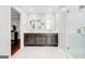 Stylish bathroom with double sinks, a modern vanity, and a glass-enclosed shower at 8575 Haven Wood Trl, Roswell, GA 30076