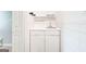 Clean mud room featuring built-in shelves and storage, perfect for organizing essentials at 8575 Haven Wood Trl, Roswell, GA 30076