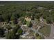 Aerial view of the property surrounded by trees at 6942 Cottonwood Trl, Riverdale, GA 30296