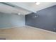 Unfinished basement with tile flooring, neutral walls and ceilings at 6942 Cottonwood Trl, Riverdale, GA 30296