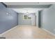 The spacious bedroom features tiled floor, a ceiling fan, and a bright window at 6942 Cottonwood Trl, Riverdale, GA 30296