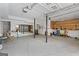 The spacious garage features a concrete floor, overhead lighting, and ample storage at 6942 Cottonwood Trl, Riverdale, GA 30296