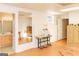 Large basement area featuring a sewing table, bright lighting, and reflective mirror at 17 Hampton Way, Carrollton, GA 30116