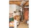 Unfinished basement with exposed duct work, pink insulation, and plenty of storage space at 17 Hampton Way, Carrollton, GA 30116
