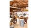 Unfinished basement work area with pegboard and overhead lighting perfect for projects at 17 Hampton Way, Carrollton, GA 30116