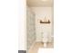 Cozy bathroom showcasing a patterned shower curtain, toilet, and cute nautical decor at 17 Hampton Way, Carrollton, GA 30116
