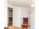Spare bedroom with wood floors and view of the stairwell at 17 Hampton Way, Carrollton, GA 30116